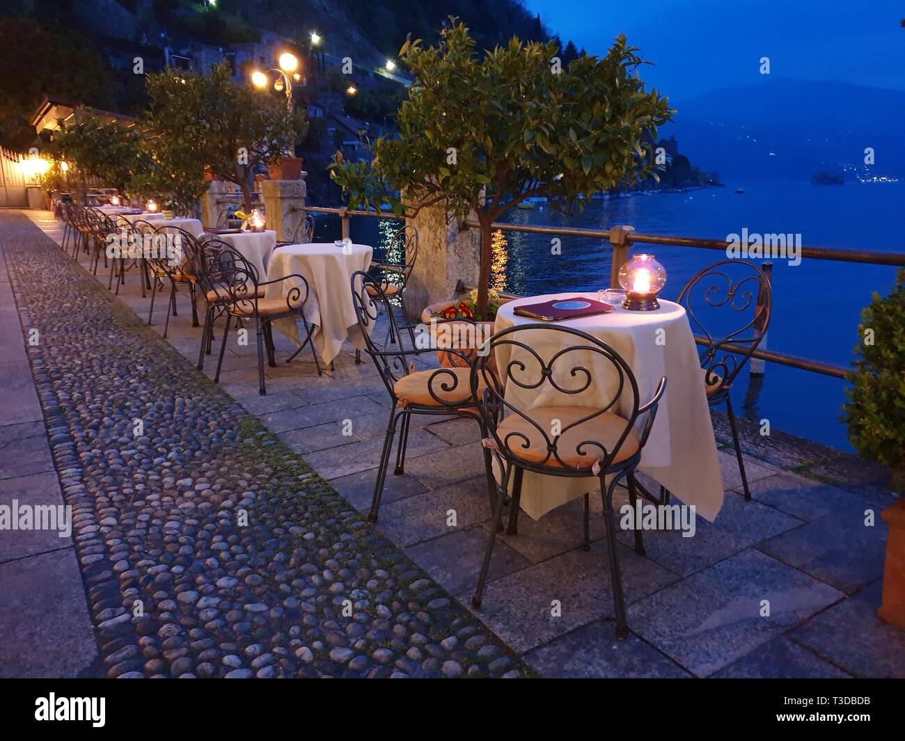 Image of beautiful promenade with candle light dinner arrangement in