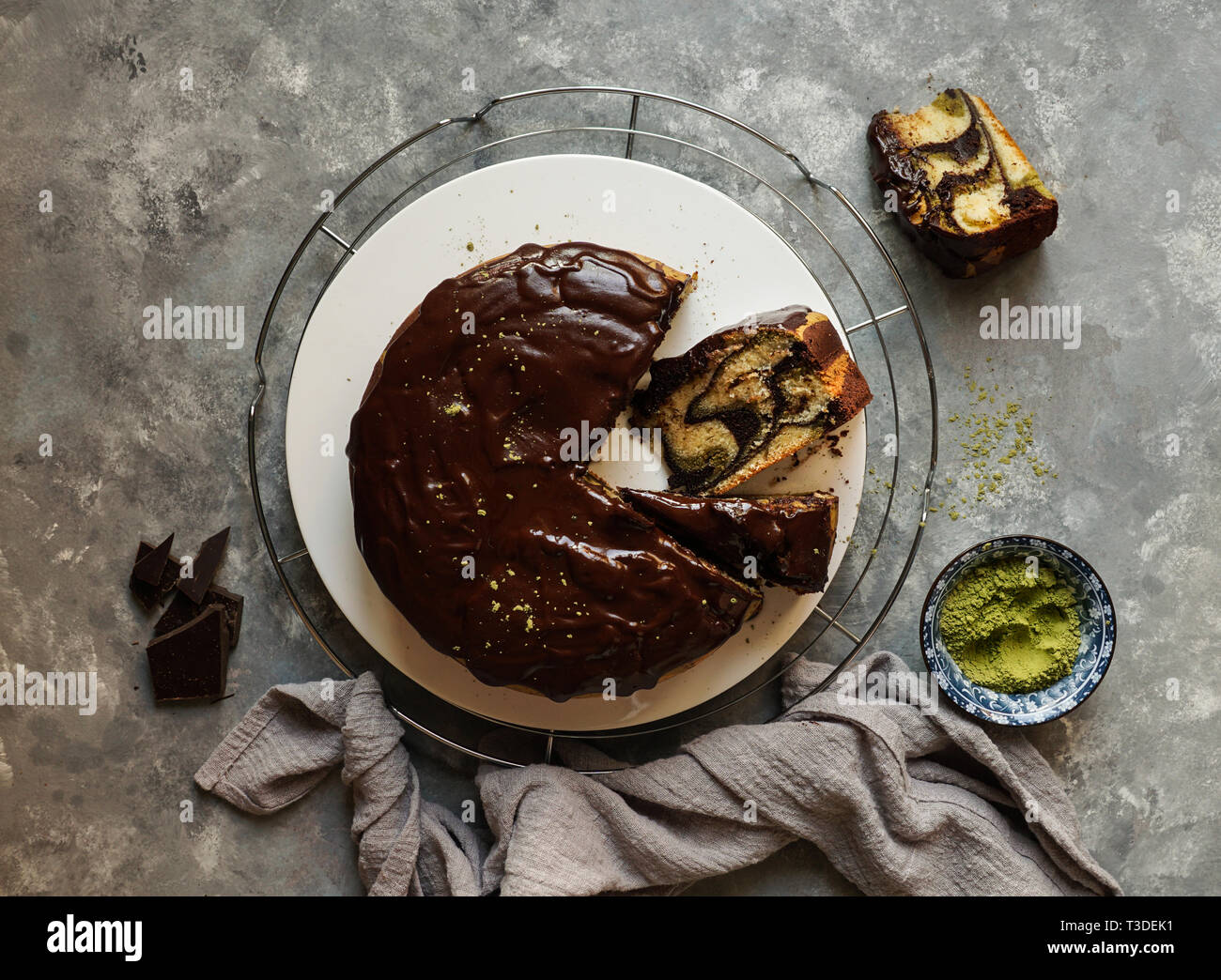 matcha green tea and chocolate cake. top view, copy space, grey background Stock Photo