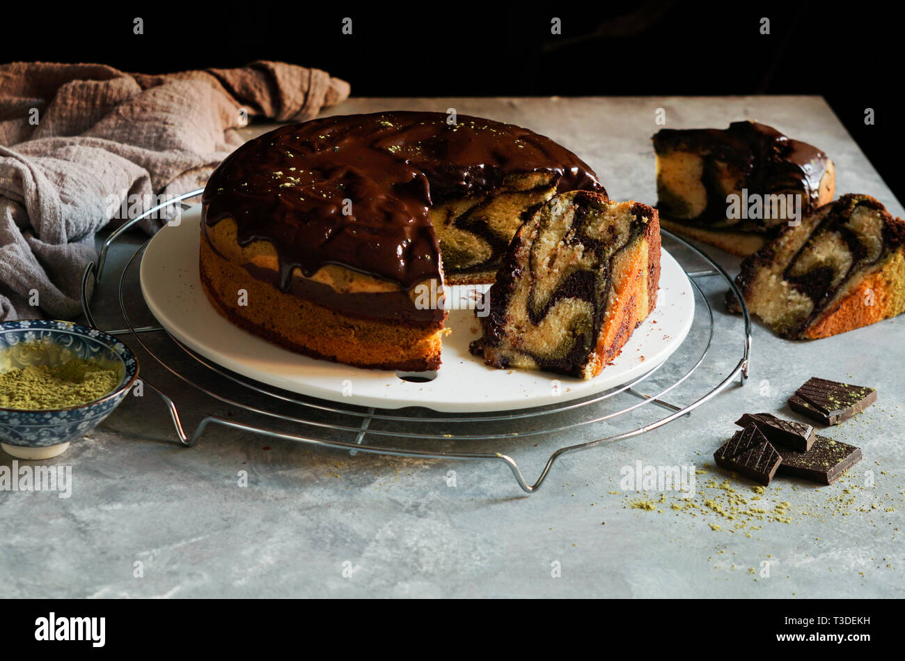 matcha green tea and chocolate cake. top view, copy space, grey background Stock Photo