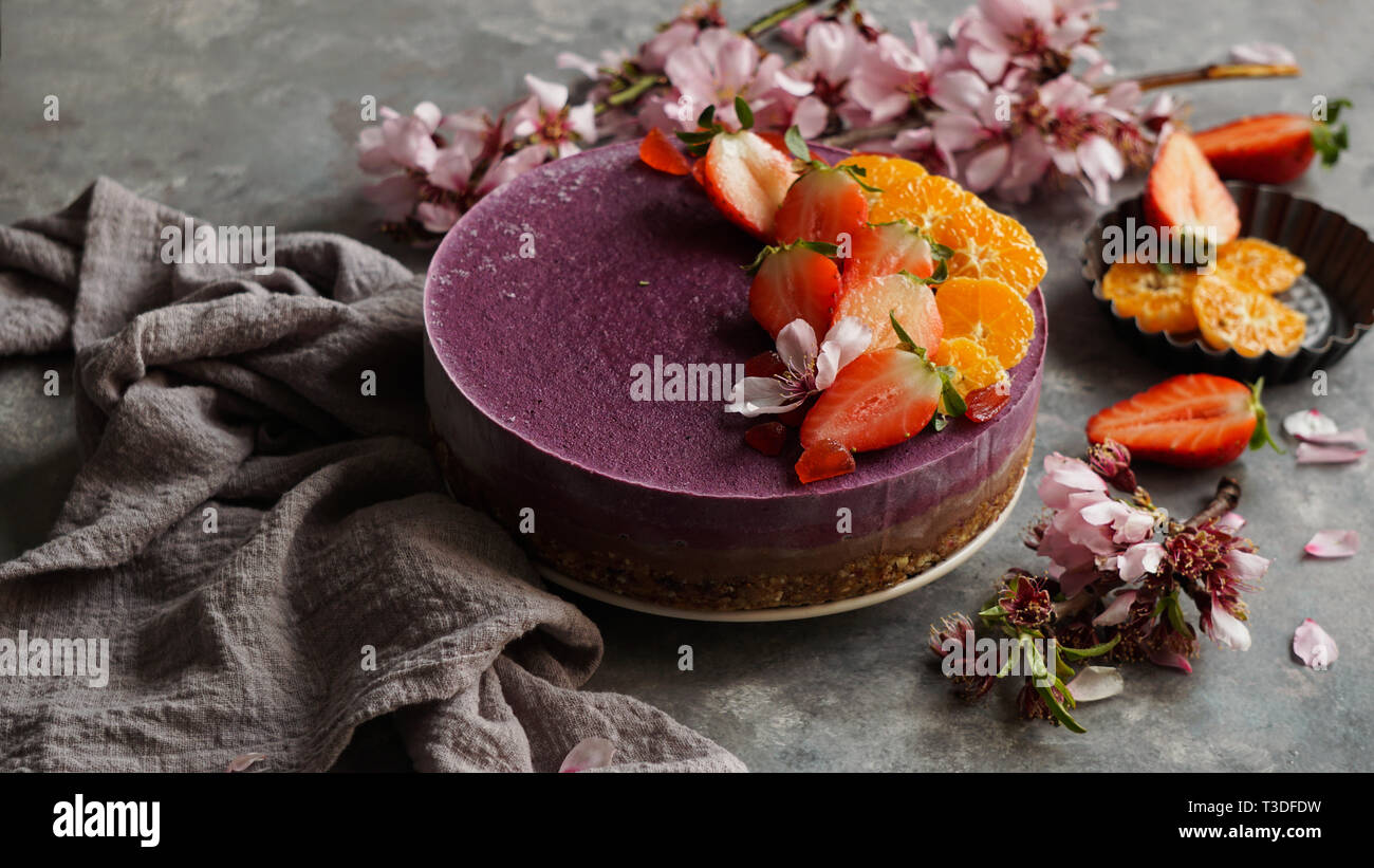Raw Vegan Cake With Fruit And Seeds Decorated With Flowers Stock Photo Alamy