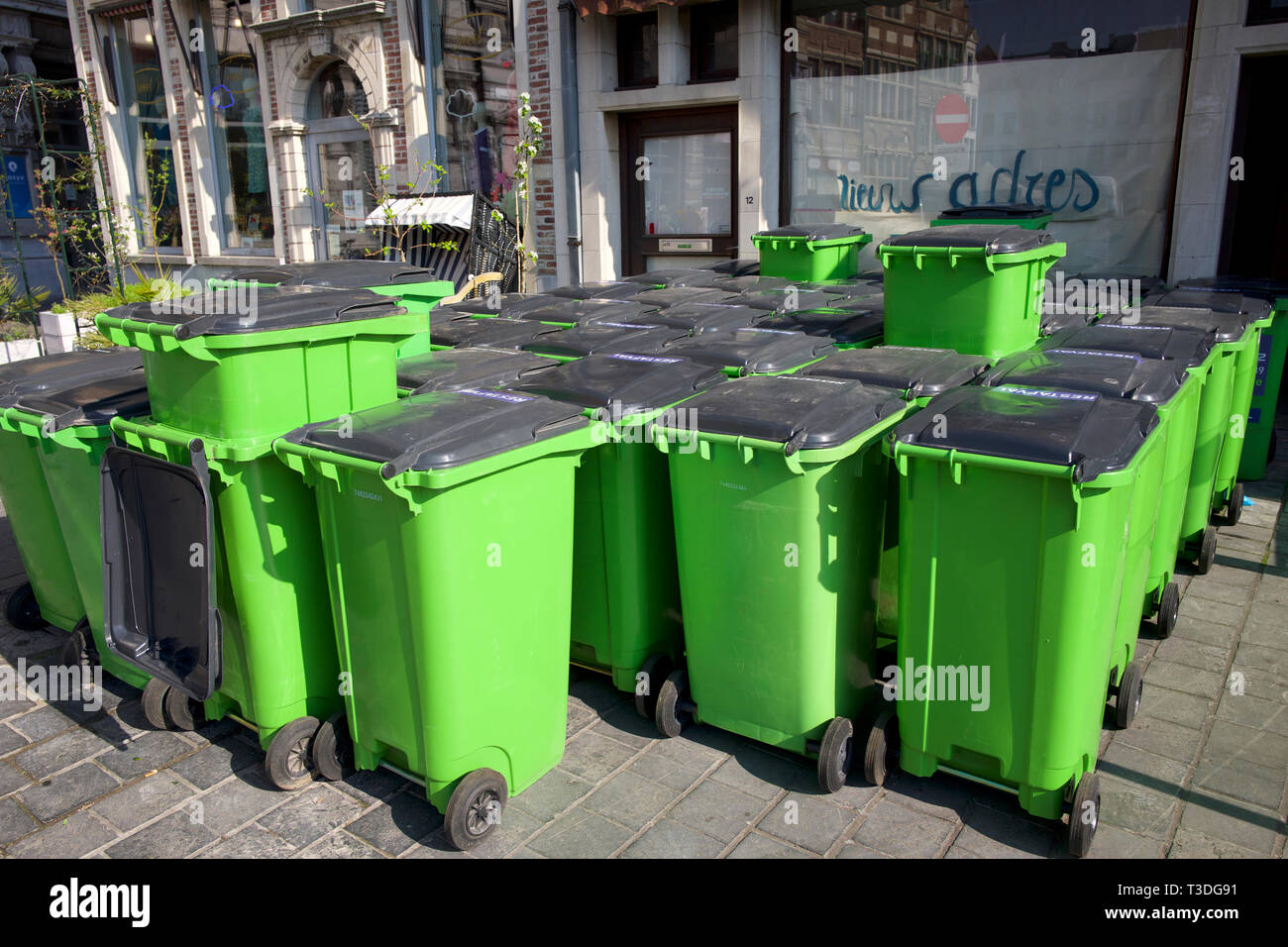 Green wheelie bins Stock Photo