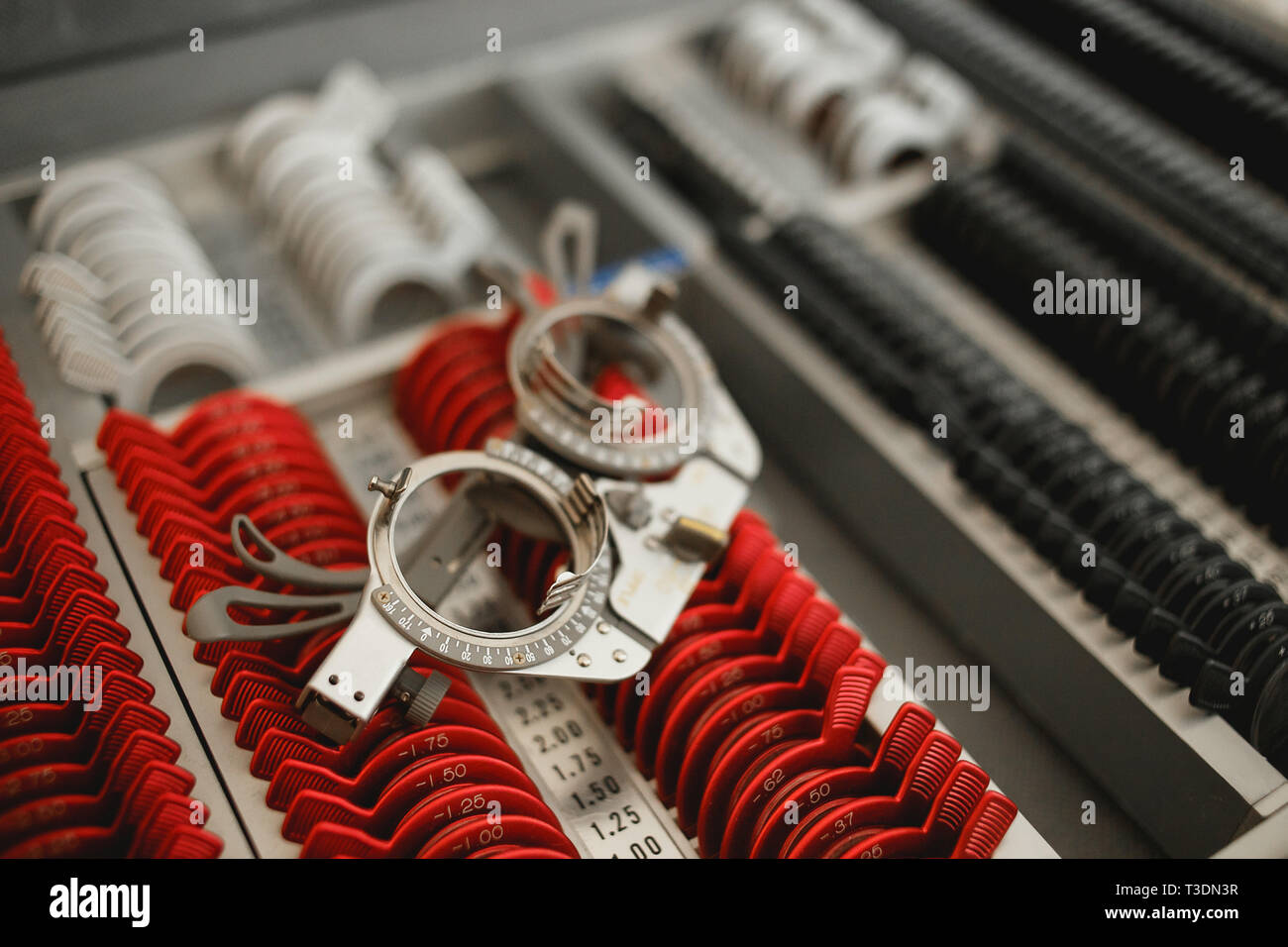 Ophthalmological equipment - sets of trial spectacle lenses. Stock Photo