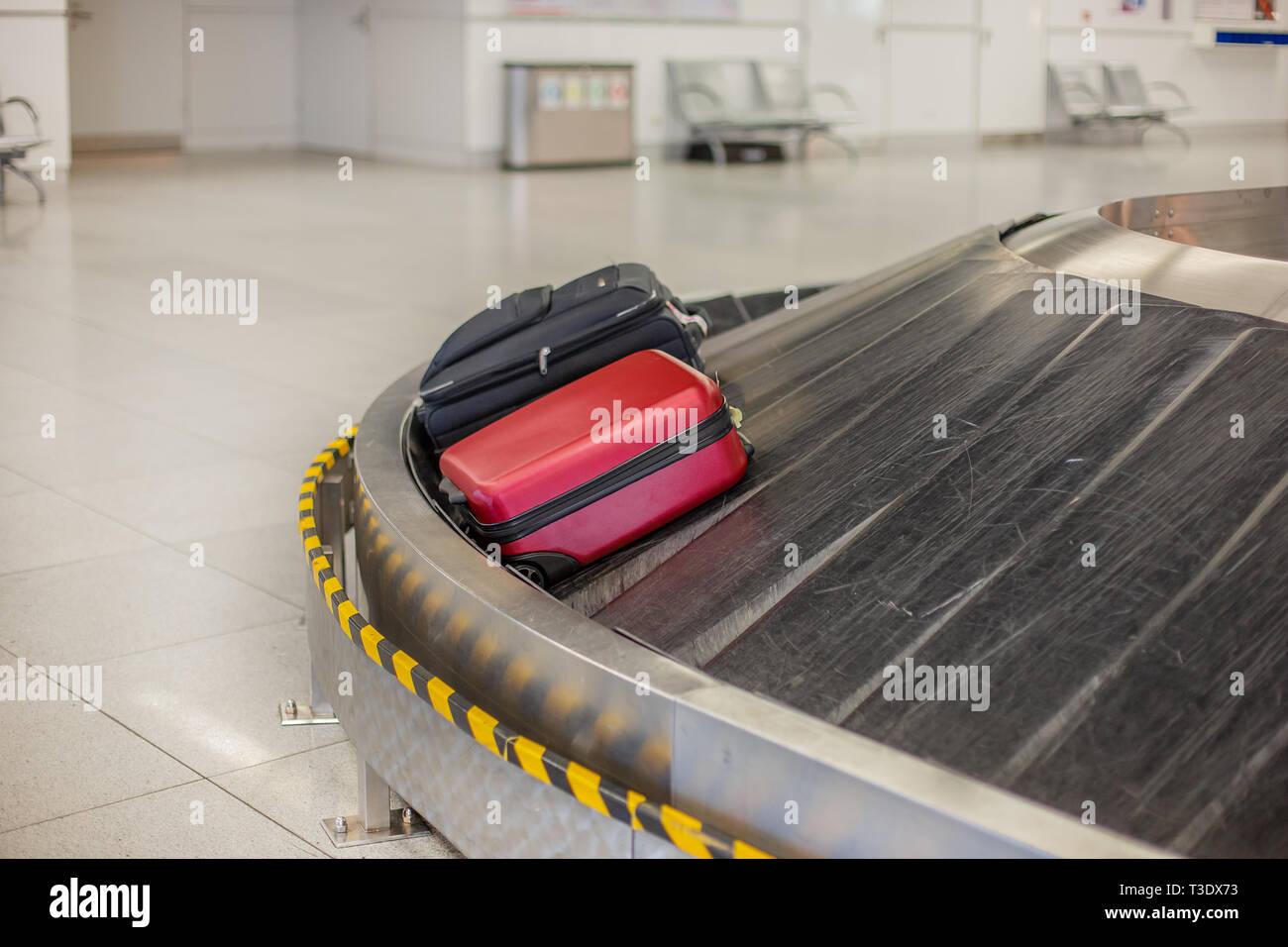 Lost luggage at the airport. Baggage sorting Luggage on conveyor belt