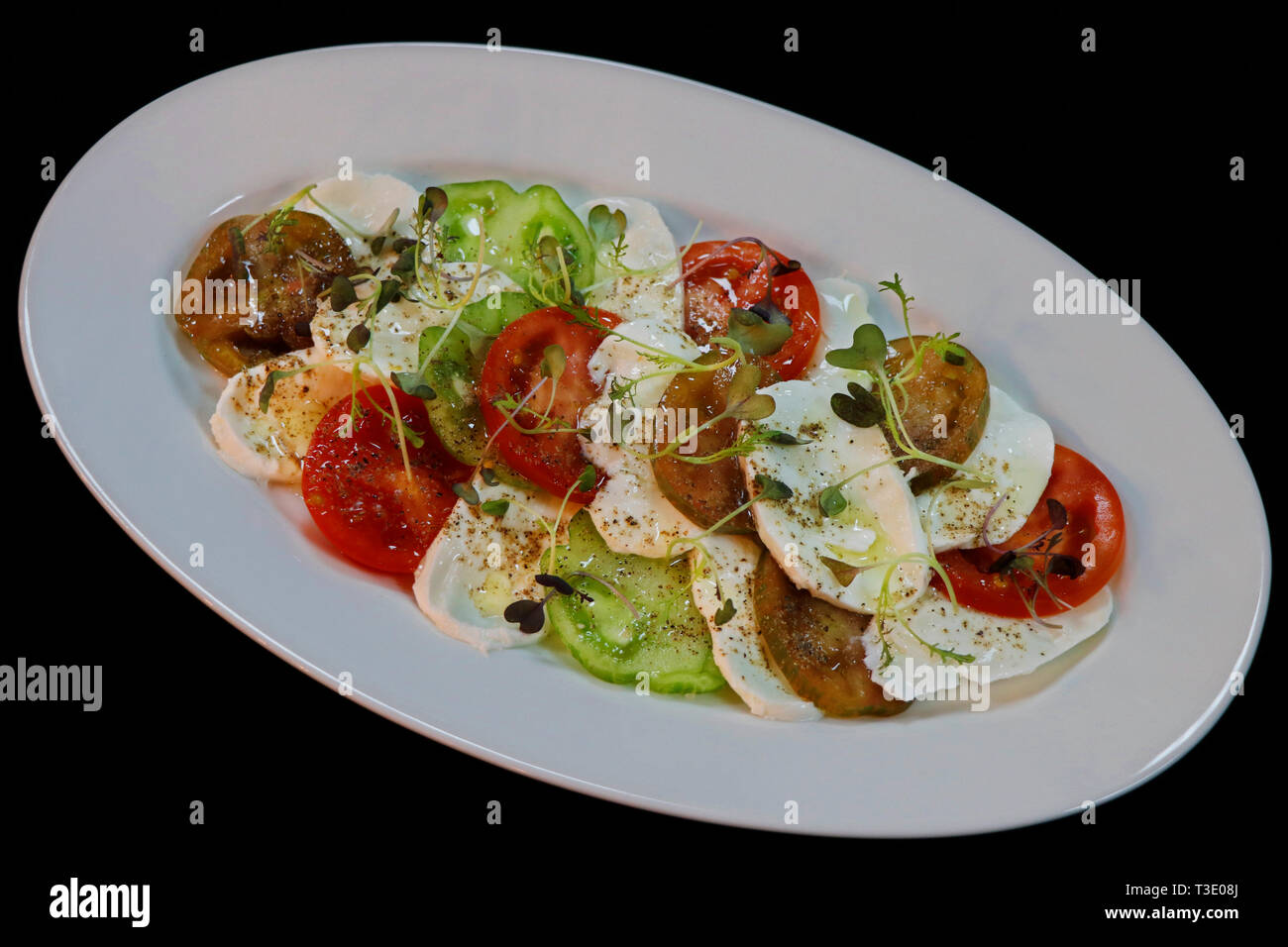 heirloom tomatoes and mozzarella salad Stock Photo Alamy