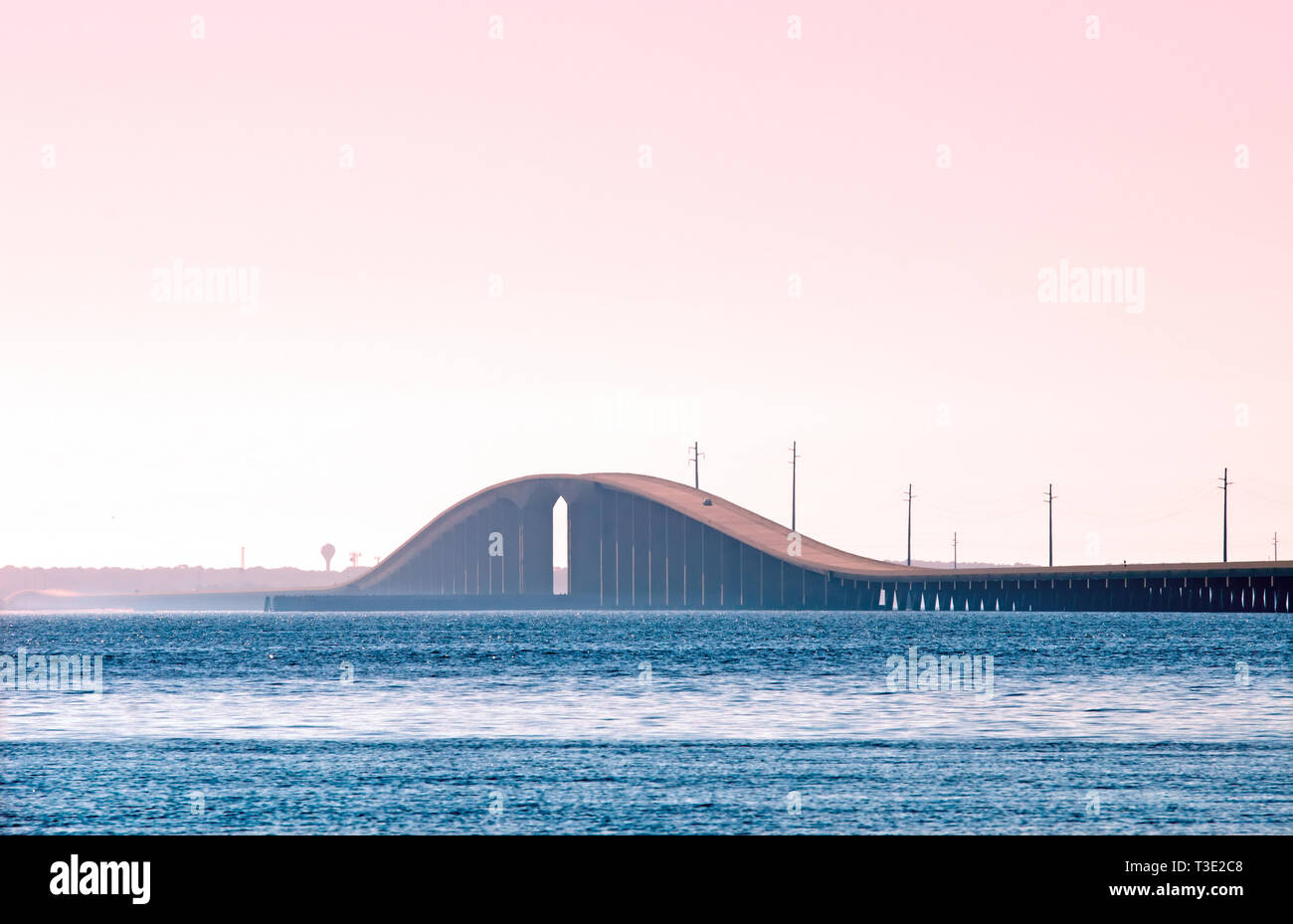 https://c8.alamy.com/comp/T3E2C8/the-dauphin-island-bridge-is-pictured-at-sunrise-in-dauphin-island-alabama-T3E2C8.jpg