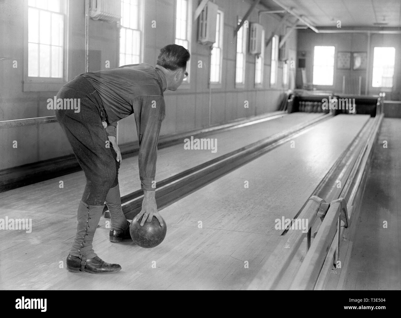 Blind man bowling at bowling alley at Institute for the Blind in Washington D.C. ca. 1918 Stock Photo