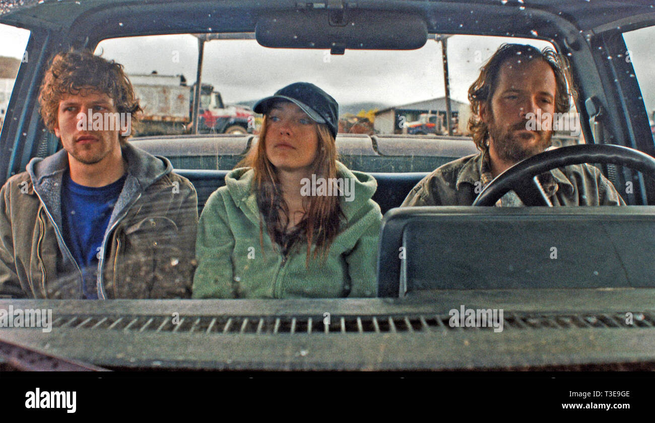 NIGHT MOVES 2013 film with from left: Jesse Eisenberg, Dakota Fanning, Peter Sarsgaard Stock Photo