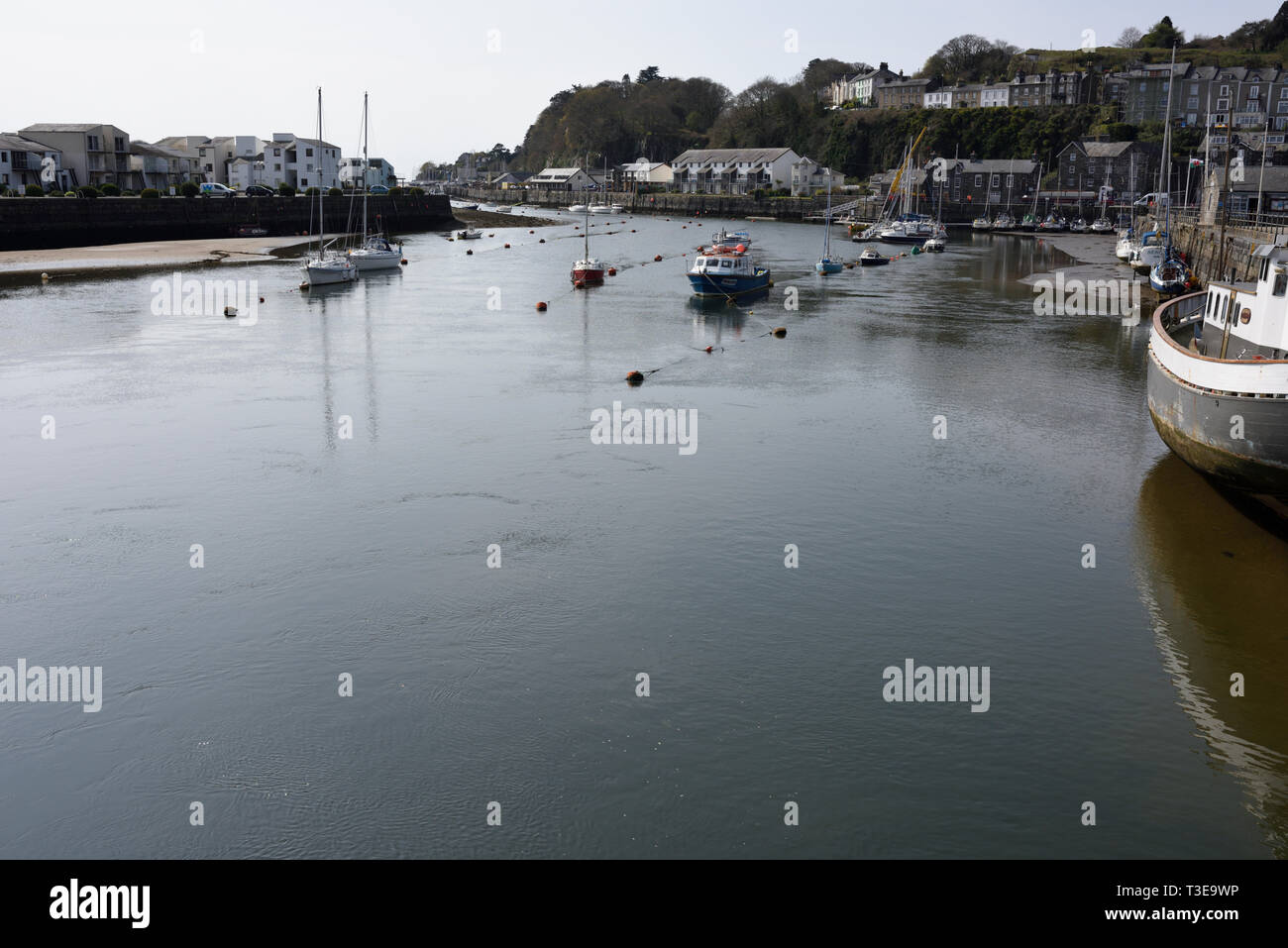 Porthmadog harbour with boats attached to mooring buoys in north wales