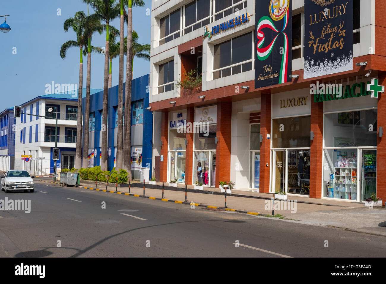 A street with modern shops in Malabo, the capital of Equatorial Guinea in Africa Stock Photo