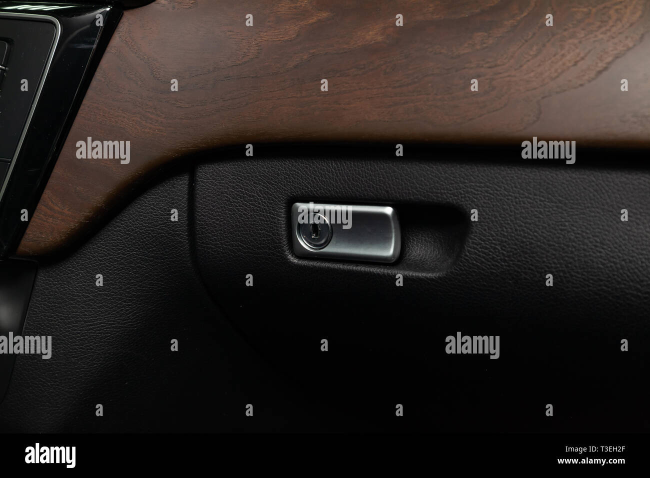 Chromeplated lock and handle for opening on the glove compartment of