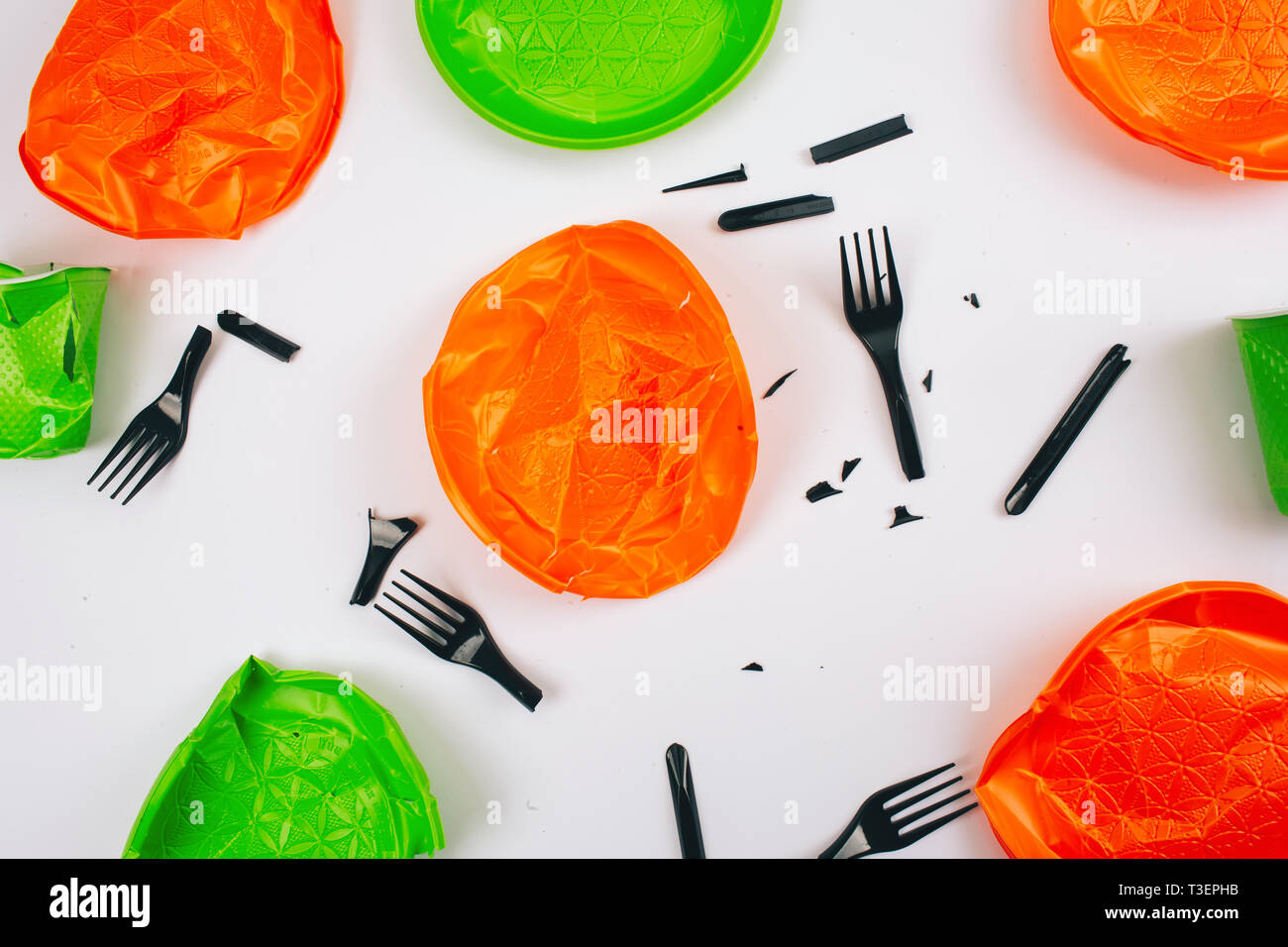 Be plastic free. Singleuse colorful bright broken plastic plates and