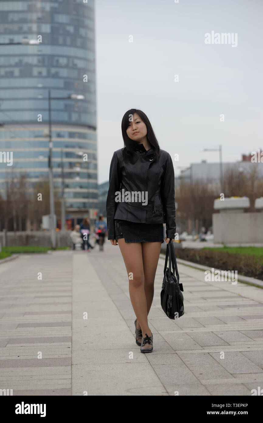 Asian woman in leather jacket hi-res stock photography and images - Alamy