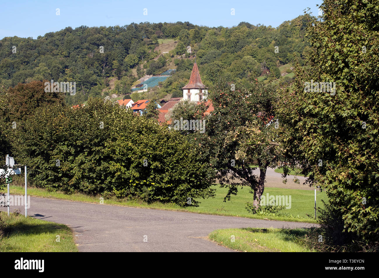 Bavaria Germany, walking path passing rural village with apple orchard ...