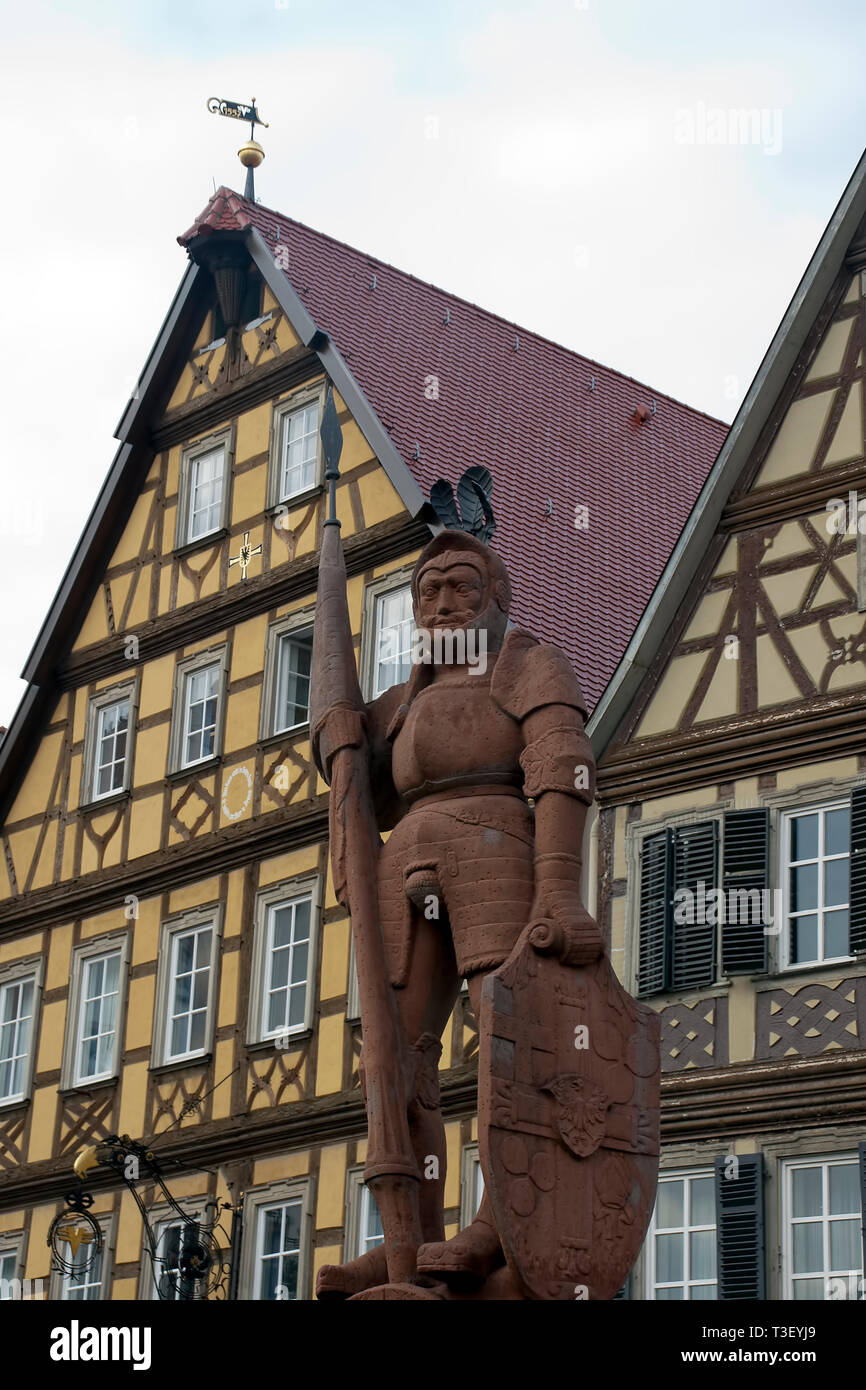 Bad Mergentheim Germany, 1926 statue of Teutonic knight in front of traditional half-timbered houses Stock Photo