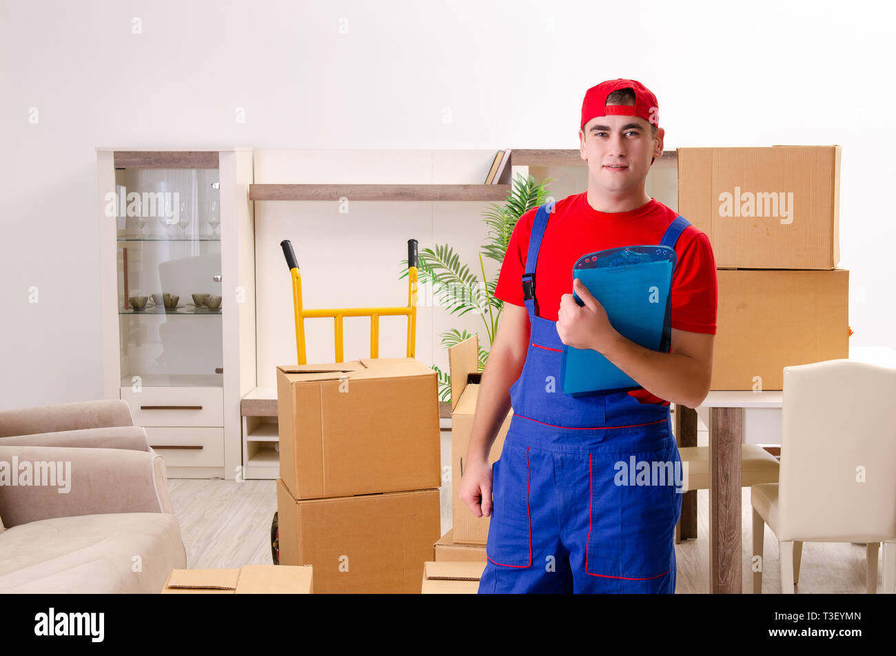 Young contractor boxes working hi-res stock photography and images - Alamy