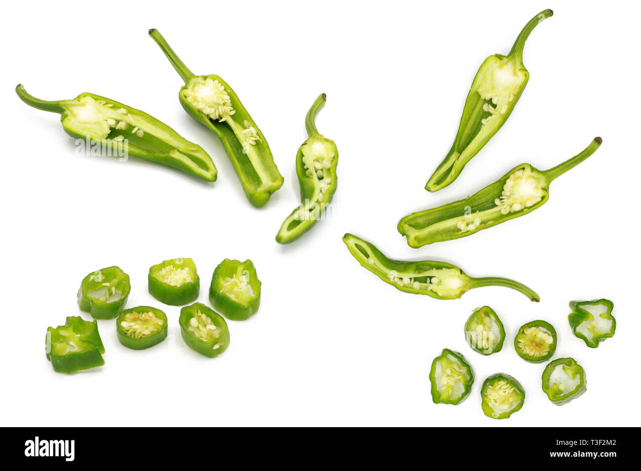 chilli pod set of fresh whole and chopped fresh green chili peppers