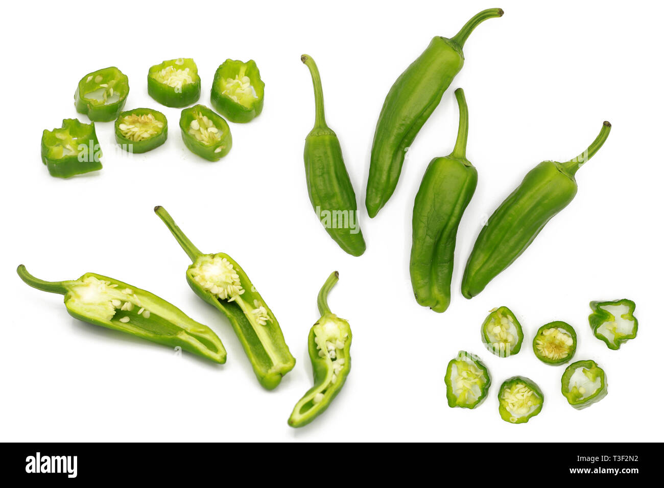 chilli pod set of fresh whole and chopped fresh green chili peppers