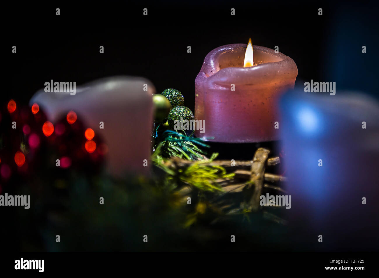 Burning down candles on advent wreath, details Stock Photo Alamy