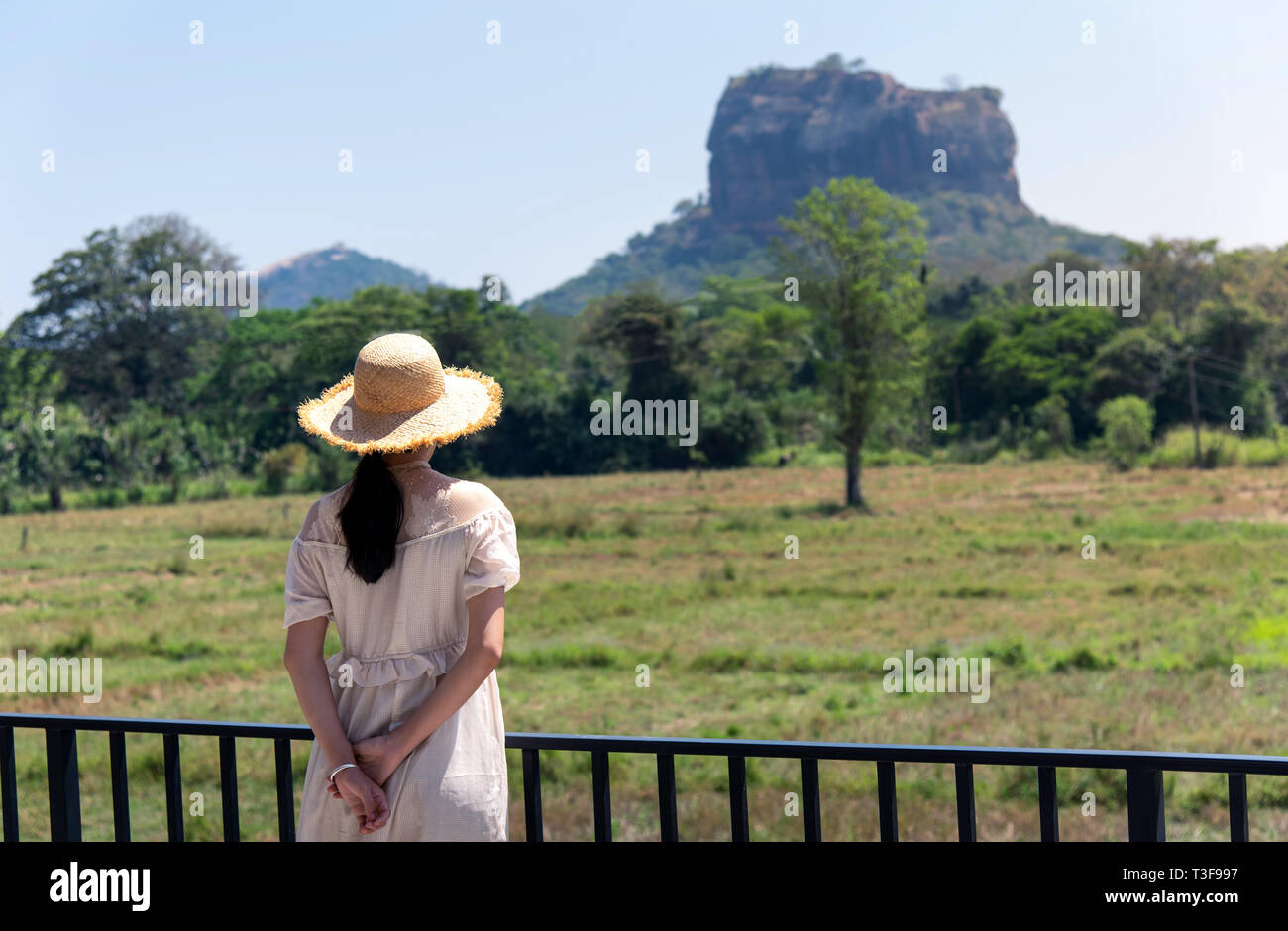 Woman enjoying Sigiriya rock view in Sri Lanka Stock Photo