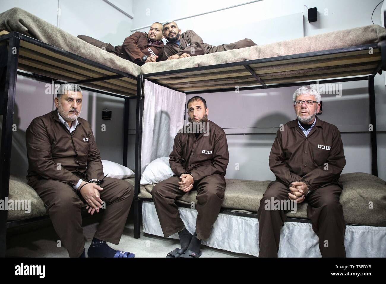 Gaza City, The Gaza Strip, Palestine. 9th Apr, 2019. Palestinian political figures in Gaza city show solidarity with Palestinian prisoners in Israeli prisons by simulation the prisons Life. Credit: Hassan Jedi/Quds Net News/ZUMA Wire/Alamy Live News Stock Photo