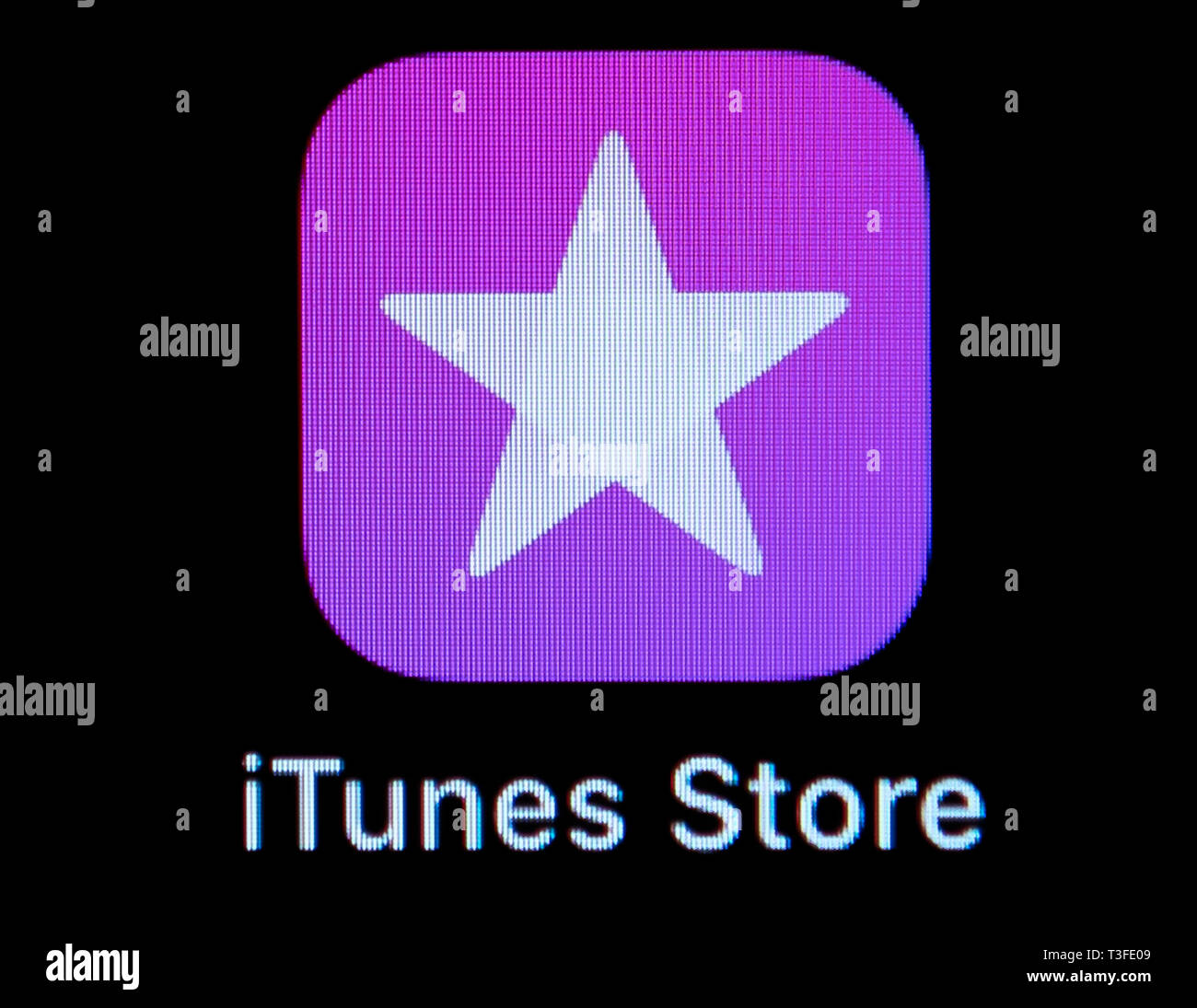 09 April 2019, Hessen, Rüsselsheim: ILLUSTRATION - The iTunes Store icon  (Application software) is visible on the screen of an iPhone. Photo: Silas  Stein/dpa Stock Photo - Alamy, image size:1300x1095