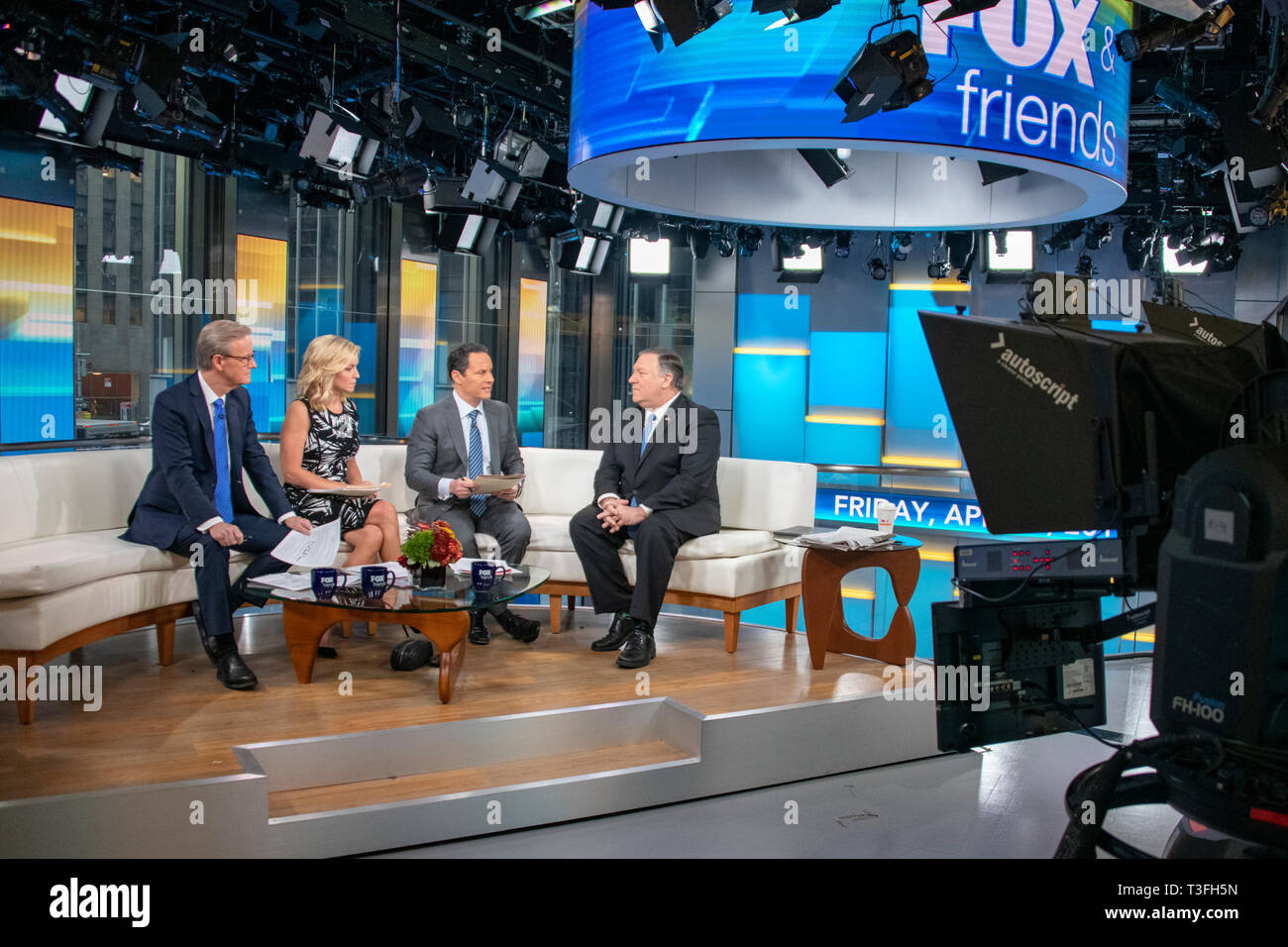 U.S. Secretary of State Mike Pompeo, right, during a television interview on Fox and Friends morning talk show at Fox News April 5, 2019 in New York City, NY. Stock Photo