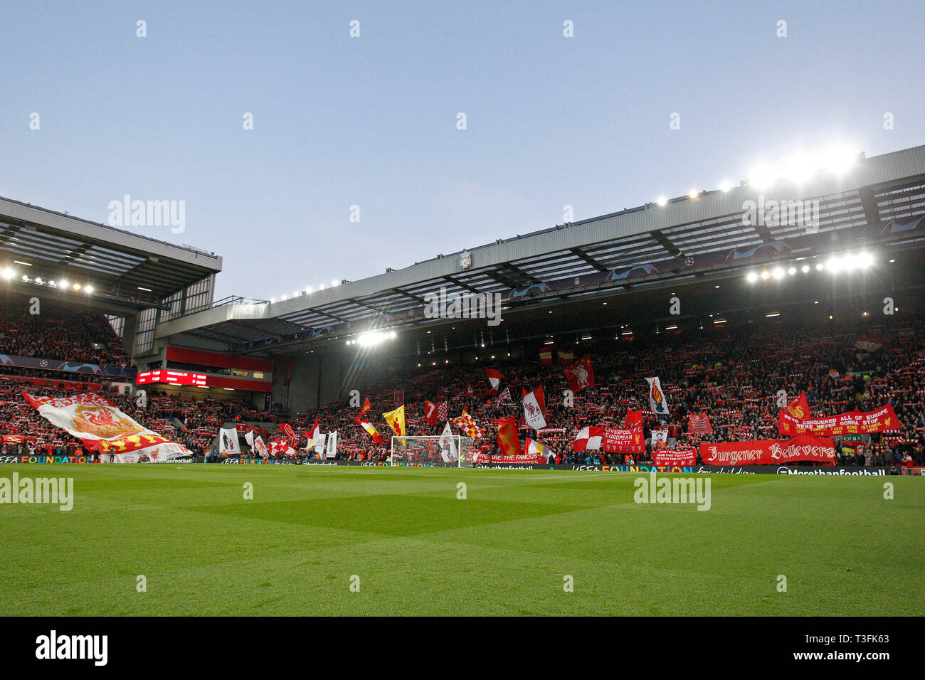 Liverpool, UK. 09th Apr, 2019. The Kop singing 'You'll Never Walk Alone before the UEFA Champions League Quarter Final first leg match between Liverpool and Porto at Anfield on April 9th 2019 in Liverpool Credit: PHC Images/Alamy Live News Stock Photo