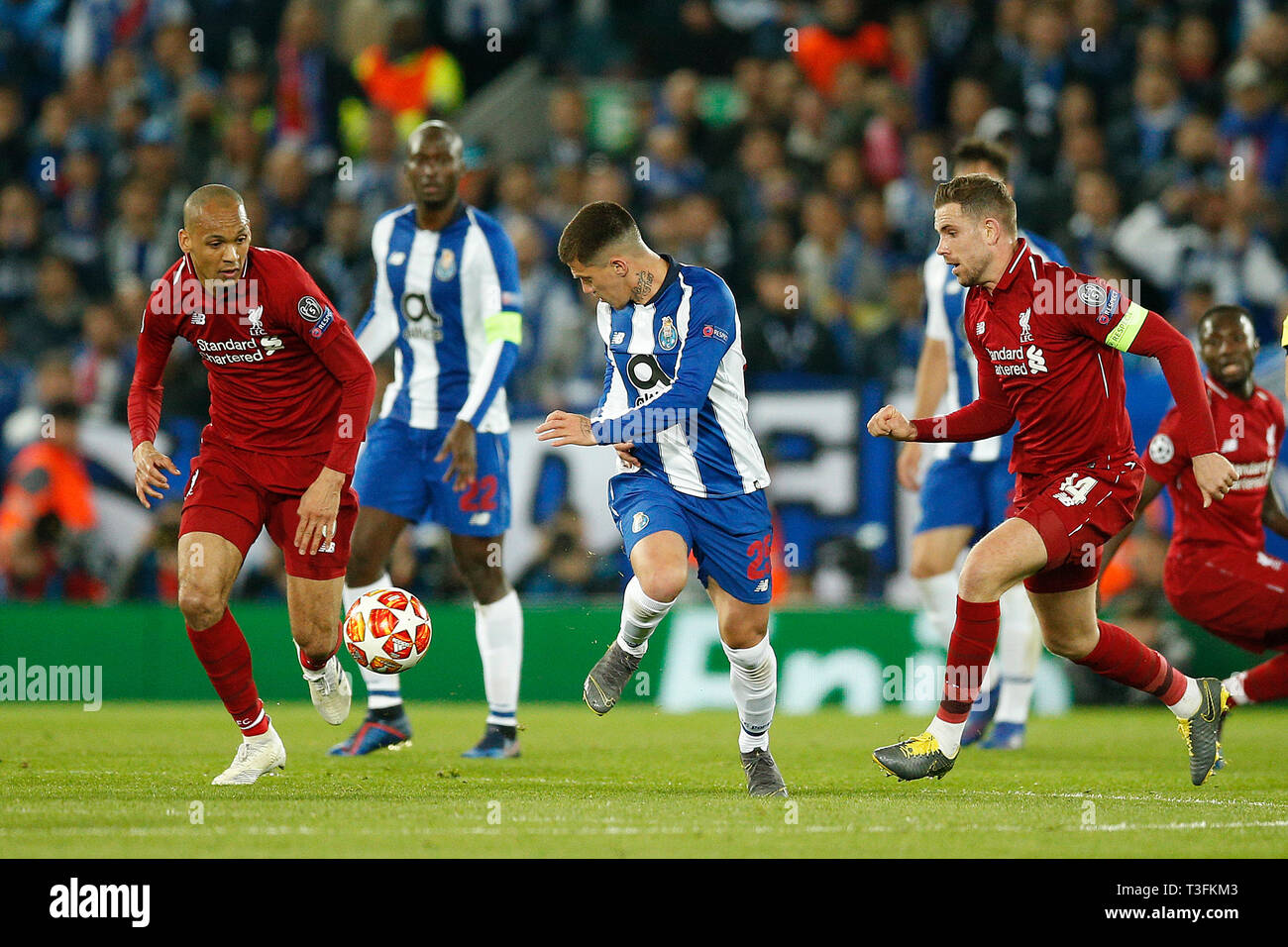 Liverpool, UK. 09th Apr, 2019. Fabinho of Liverpool, Otavio of FC Porto and Jordan Henderson of Liverpool in action during the UEFA Champions League Quarter Final first leg match between Liverpool and Porto at Anfield on April 9th 2019 in Liverpool Credit: PHC Images/Alamy Live News Stock Photo