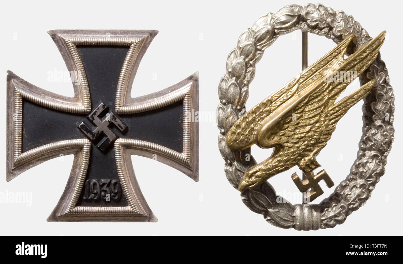 Ernst Springer, the 'Bugler of Crete', a Paratrooper Badge and an Iron Cross 1939 1st Class Paratrooper Badge in non-ferrous metal version, the silver-plated wreath stamped in fine detail, with a riveted gilt eagle riveted, and the maker's inscription, 'Imme & Sohn Berlin' on the back. In the blue presentation case with the corresponding gold-stamped inscription. Iron Cross 1939 1st Class, the lightly convex version with a blackened iron core and silver-plated edging. Black presentation case with a silver-stamped silhouette of the medal. There is also the book, 'Kreta - Sie, Editorial-Use-Only Stock Photo