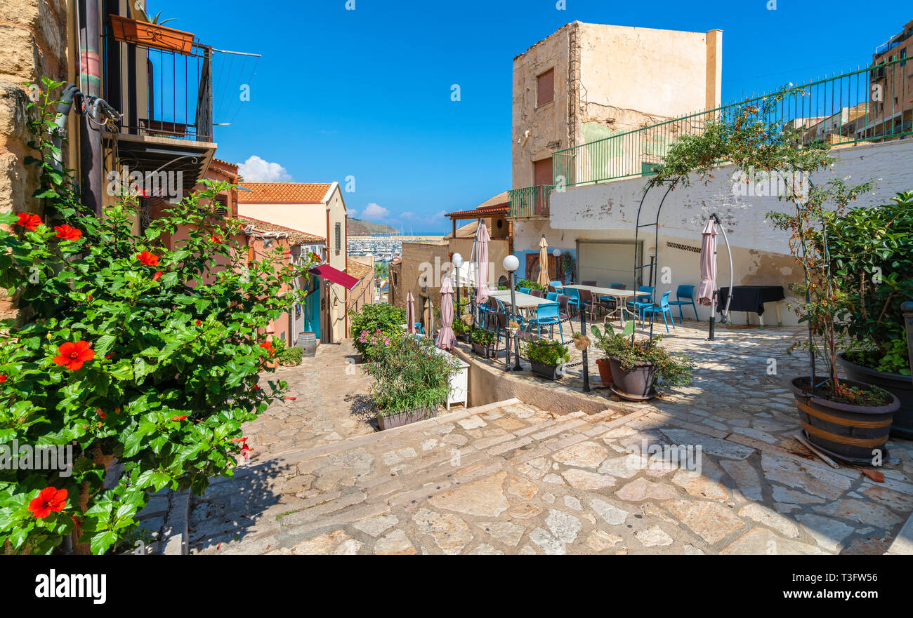 Historic village of Castellammare del Golfo with terrace, bar and  restaurant in Sicily, Italy Stock Photo - Alamy