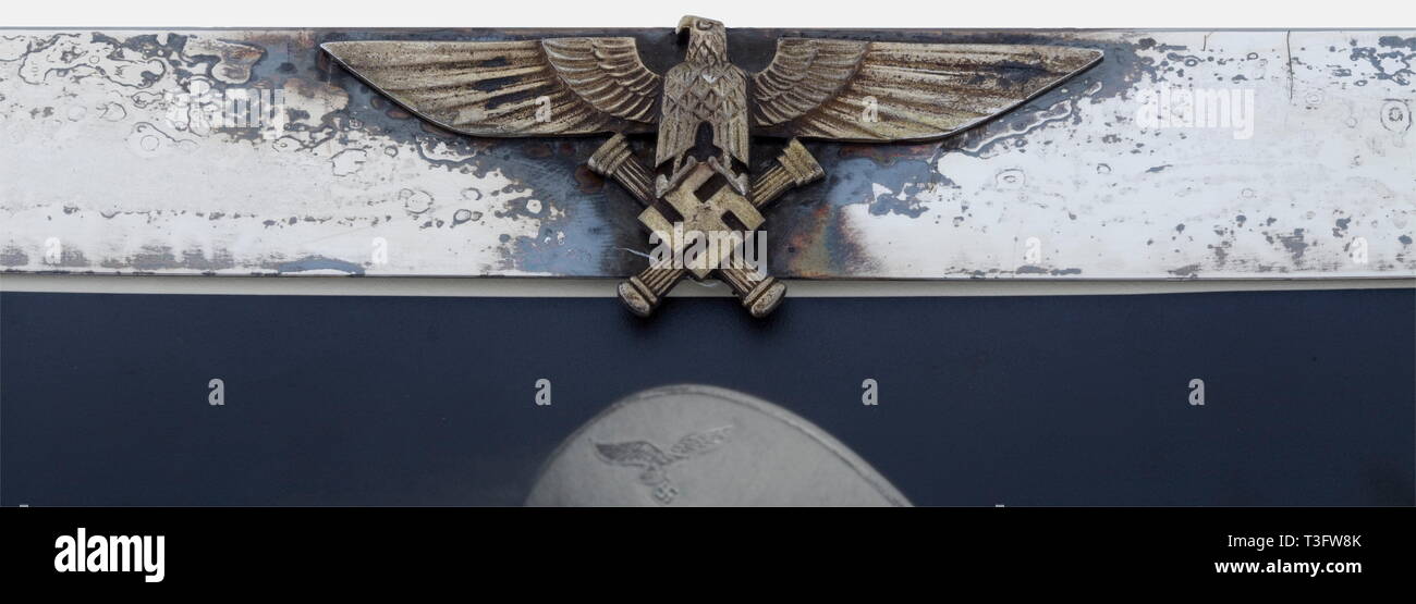 Hermann Göring, a large silver presentation frame A large format Röhr photograph of Göring as Reich Marschal in summer uniform with service cap, cloak, marshal's baton, and wearing the Pour le mérite, Knights Cross, and Grand Cross of the Iron Cross. Under glass in a hammered silver frame bearing the Reich Marshal's eagle. Darkened, with the unclear mark of his favorite jeweller, Prof. Zeitner, on the lower right edge. Dimensions 36 x 29 cm. historic, historical, 1930s, 20th century, NS, National Socialism, Nazism, Third Reich, German Reich, Germany, German, National Social, Editorial-Use-Only Stock Photo