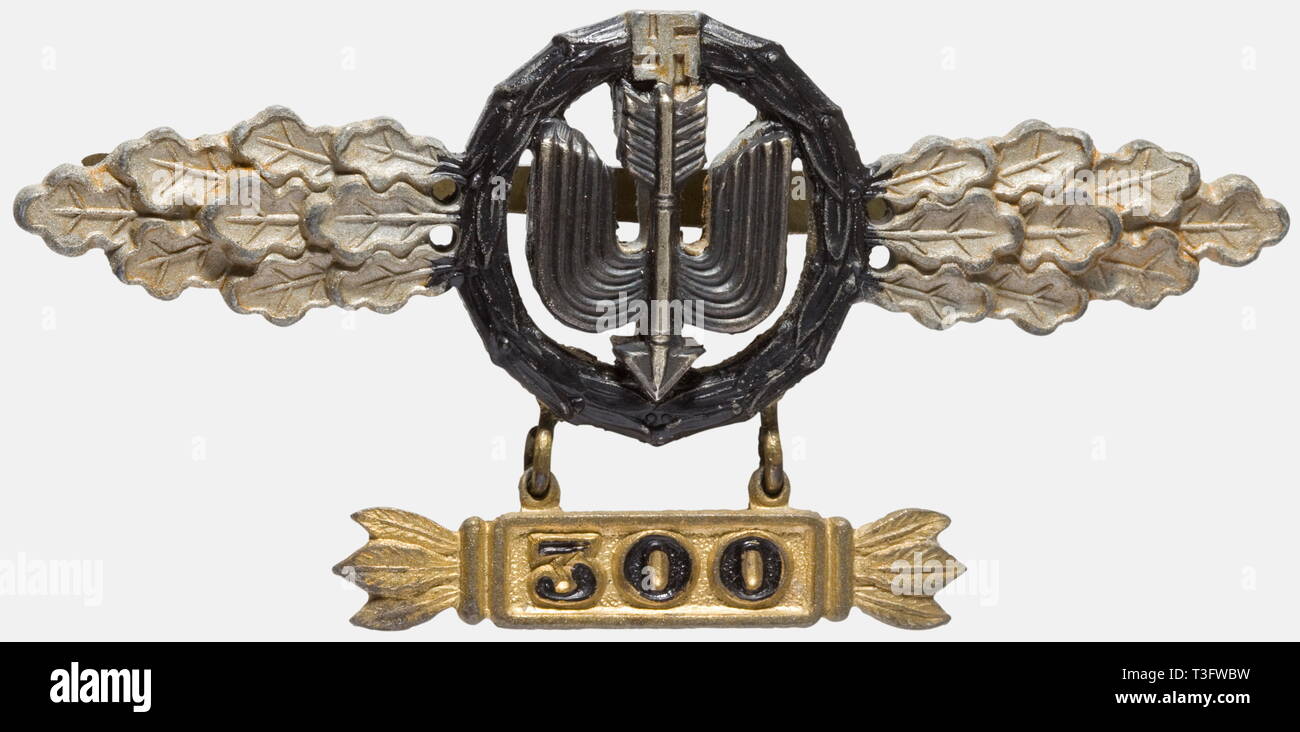 A Squadron Clasp for Long-Range Night Fighter Pilots, with pendant for 300 flights Fine zinc issue with blackened wreath, riveted, dark patinated arrow appliqué, waisted iron attachment pin. Gilding remains only on the pendant and attachment pin. Clasp for night fighters turned upside down with the pendant soldered above (Nie 7.07.28). Included is the award document for the Night Fighter Clasp in Gold with Pendant for a Feldwebel (NCO) in 6./N.J.G. 2 dated 5 May 1944 with signature in ink of Radusch. Rare form with the black wreath in the illustration. hi, No-Exclusive-Use | Editorial-Use-Only Stock Photo