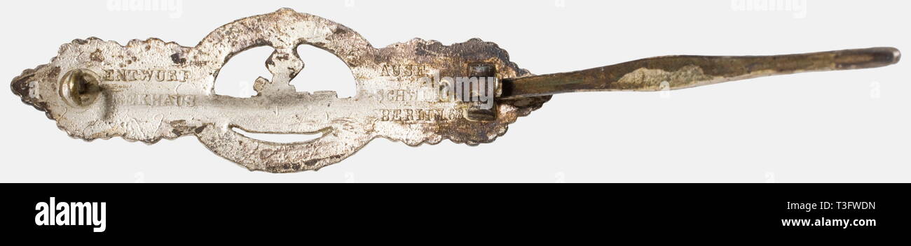 A U-Boat Front Clasp, in Silver Fine zinc issue with waisted,  hollow-grooved iron attachment pin and inset hook clasp, reverse marked  Entwurf Peekhaus - Ausf. Schwerin Berlin. Original silver plating almost  completely