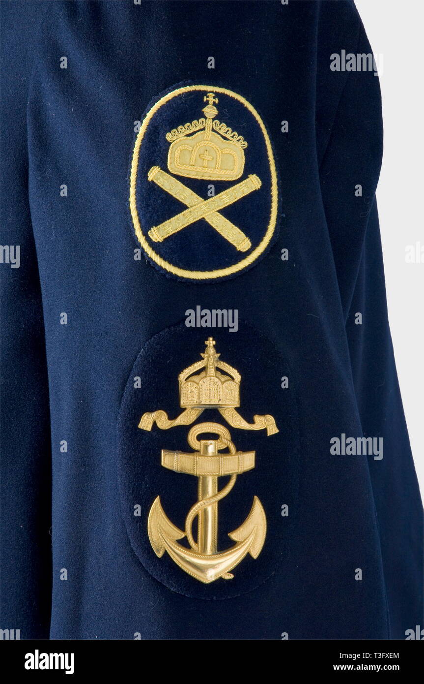 A uniform jacket for a chief boatswains mate, on the Imperial yacht 'Hohenzollern' Dark blue, double-breasted wool jacket. White collar patches, a stamped golden metal rank insignia on the left sleeve with the insignia of the gig's crew for the SMY 'Hohenzollern' embroidered above it in yellow silk. A large machine-embroidered monogram sewn on the inside pocket. Clean, colours fresh, small mended hole on the shoulder. Extremely rare Imperial Navy uniform piece. historic, historical, 1900s, 1910s, 20th century, navy, naval forces, military, milita, Additional-Rights-Clearance-Info-Not-Available Stock Photo