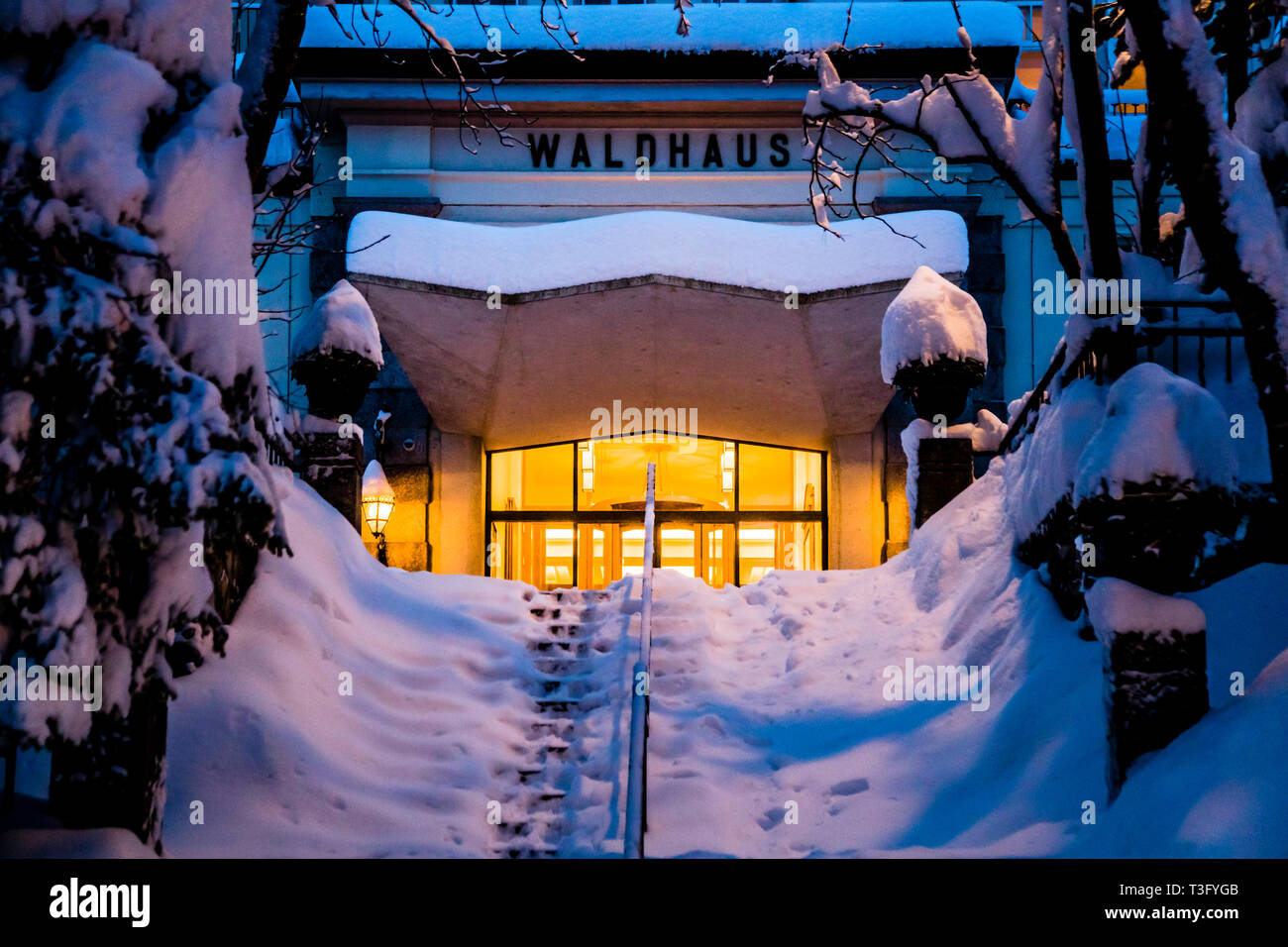 Hotel Waldhaus in Sils im Engadin/Segl, Switzerland. In winter, the snow in front of the entrance portal is cleared early in the morning Stock Photo