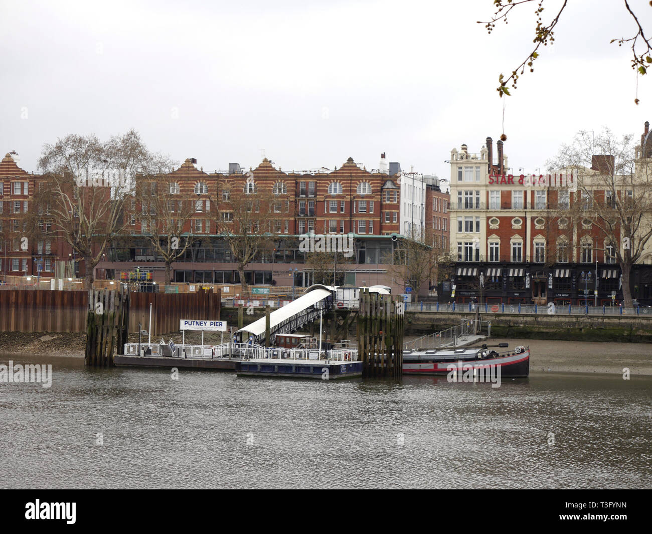 View of Putney Pier from Bishops Park, Fulham, London UK Stock Photo