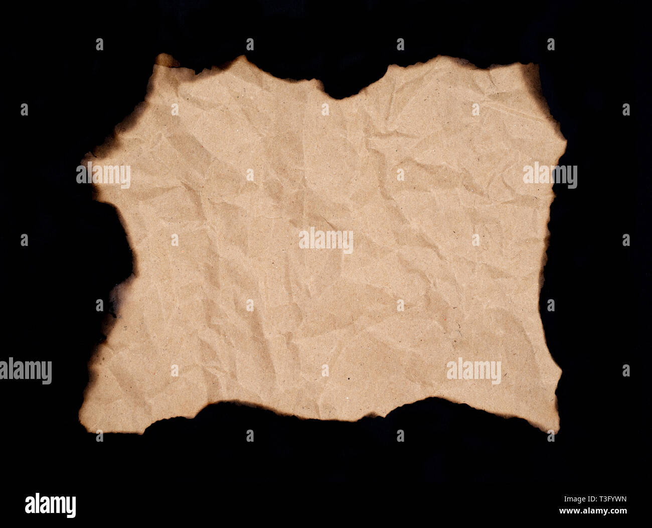 burnt paper sheet isolated on black background Stock Photo