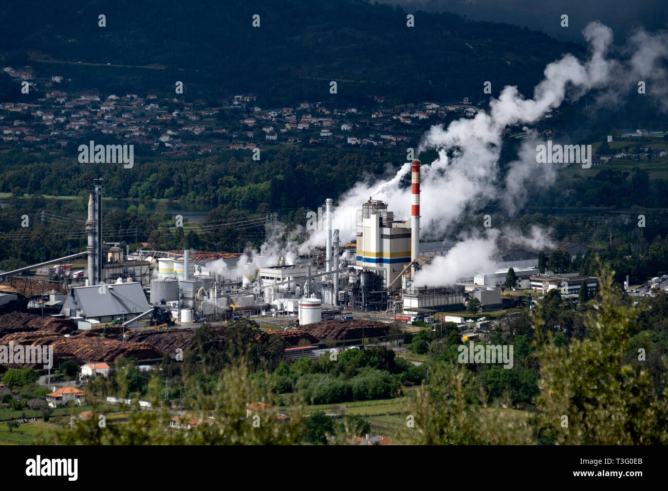 Aerial view of a factory polluting the air Stock Photo