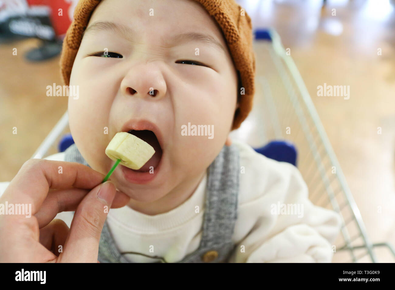 baby eating banana