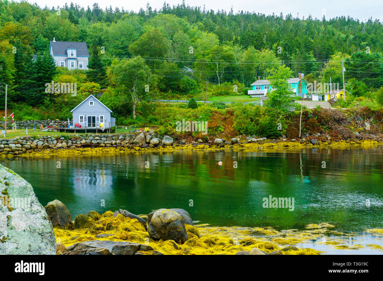 Views of the bay, boats and waterfront buildings in the fishing village
