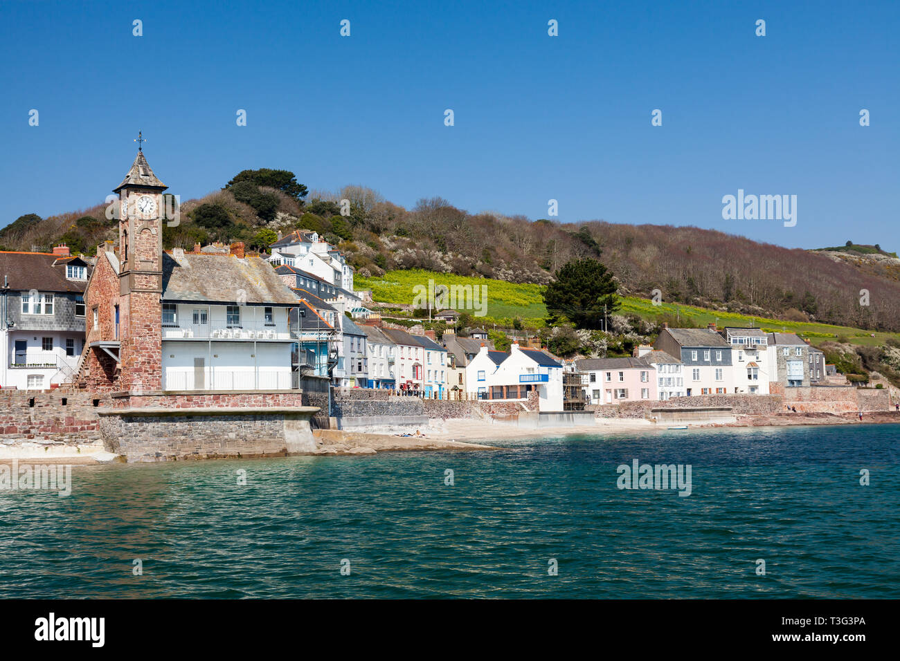 The sea front and historic clock tower at Kingsand a local landmark. Cornwall England UK Stock Photo
