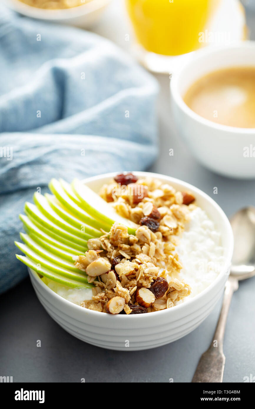 Cottage cheese with granola and apple Stock Photo