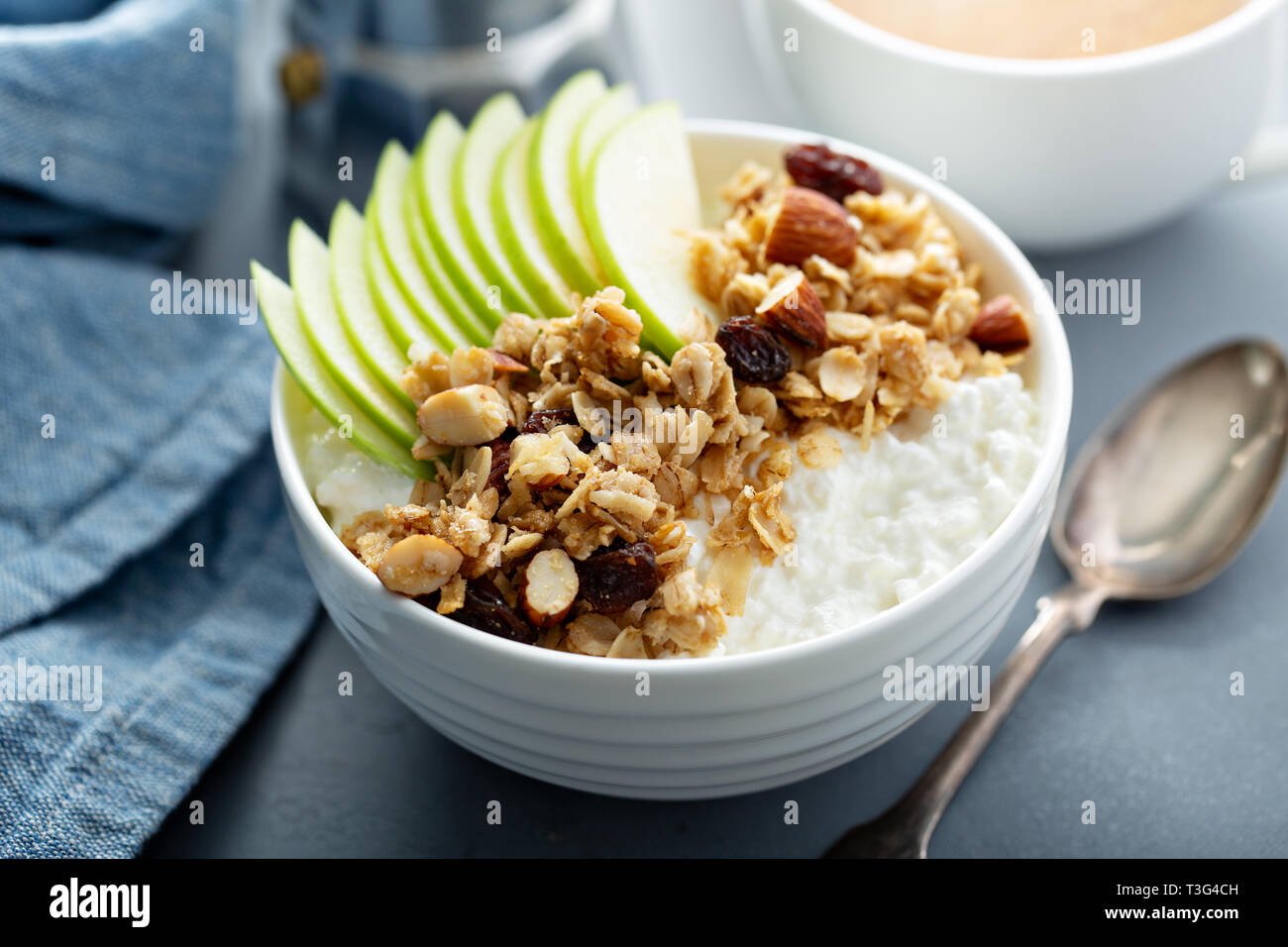 Cottage cheese with granola and apple Stock Photo