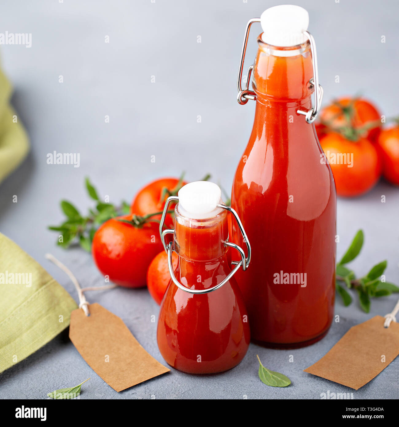 Homemade tomato ketchup in glass bottles Stock Photo Alamy