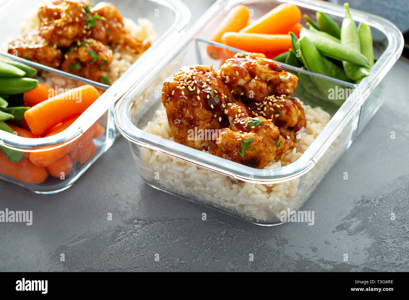 Vegan meal prep with bbq cauliflower Stock Photo