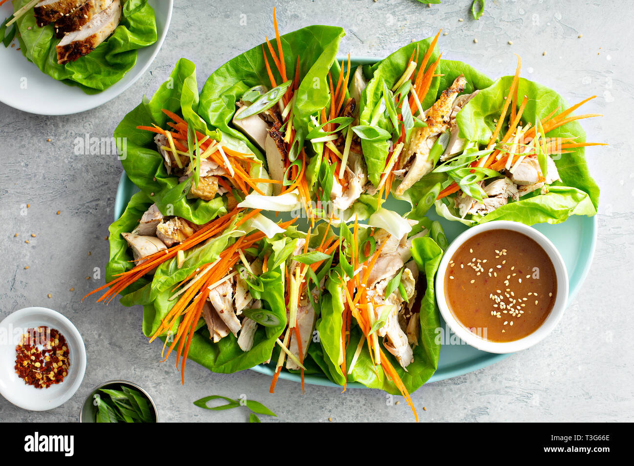 Asian grilled chicken ginger lettuce wraps Stock Photo Alamy
