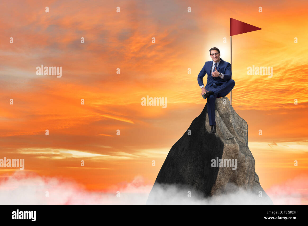 Businessman at the top of mountain Stock Photo - Alamy