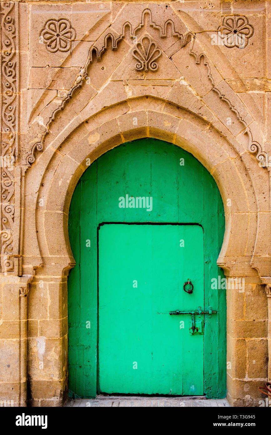 Morocco. Essaouria. City and port on the Atlantic coast of Morocco, with its medina registered as a UNESCO World Heritage Site. Focus on a green door. Stock Photo