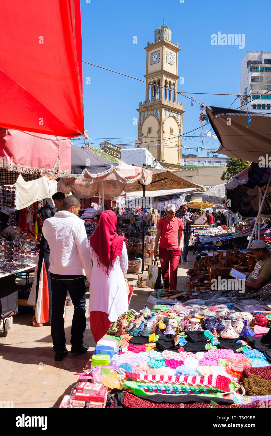 Morocco: Casablanca.  Market stalls at the entrance to the old medina. In the background, the Clock Tower (20 m) built in 1908 by Major Dessigny. ***  Stock Photo