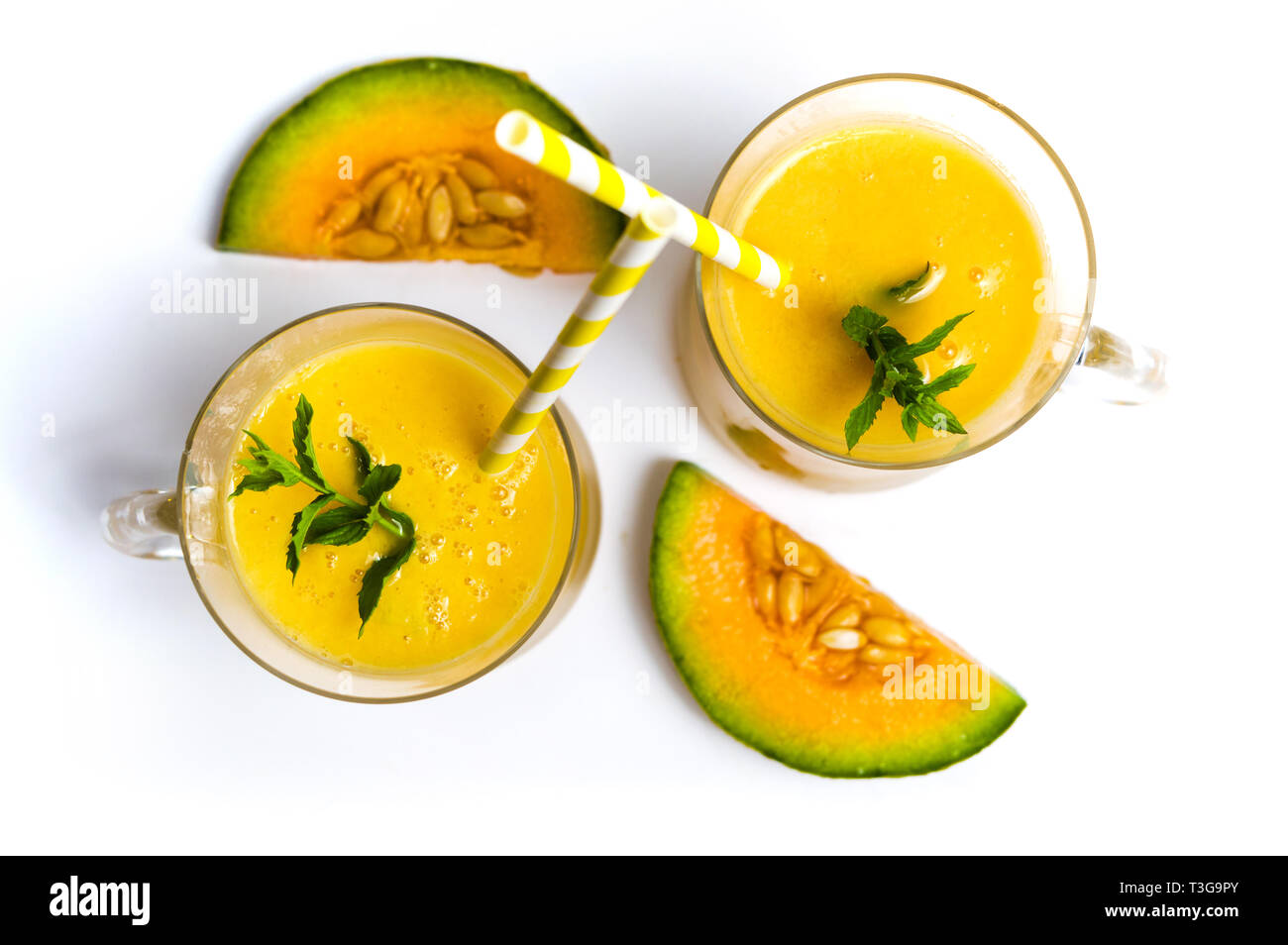 Sweet melon smoothie juice isolated on white Stock Photo